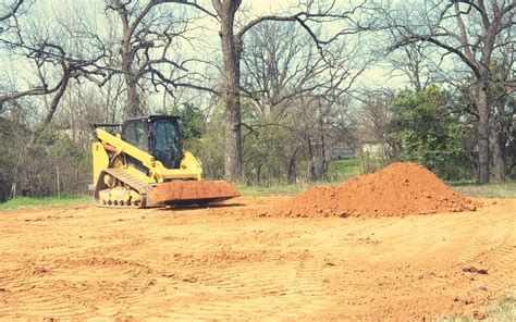 how to grade with skid steer|grading driveway with skid steer.